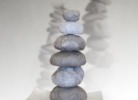 Self-heating massage stones
