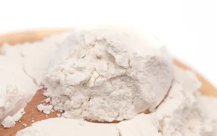 Photo de texture d'une poudre : la poudre exfoliante de riz pour le visage
